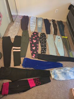Girl pants lot sizes S,M,L sold together.