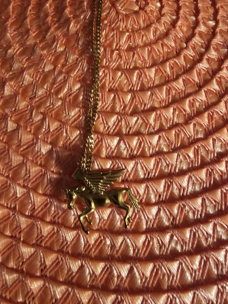 Gold plated chain with horse charms