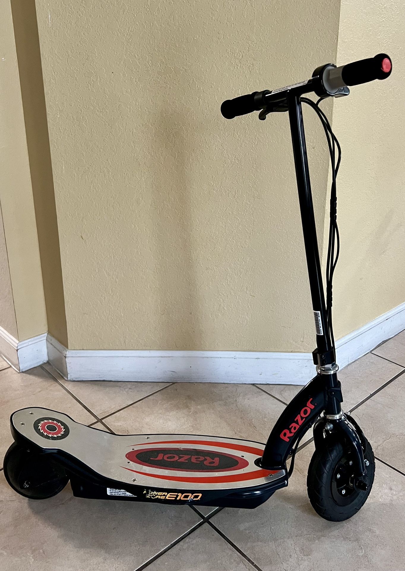 Razor Power Core E100 Electric Scooter for Kids Ages 8+ - 100w Hub Motor, 8" Pneumatic Tire, Up to 11 mph and 60 min Ride Time, for Riders up to 120 l