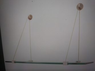 Floating glass suspension shelf