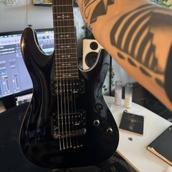 Schecter Omen-7 Seven String Guitar In Gloss Black
