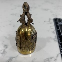 Two Ceremonial Bells From India.  Both Are Brass Even Though One Is Polished And Looks More Like Silver