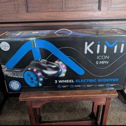 NEW in Box** Kids 3 Wheeled Electric Light up Scooter (110 lb limit, 2-9 years old) Kimi Icon