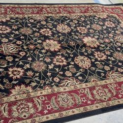 Elegant Traditional Floral Area Rug – Black & Burgundy (Excellent Condition) Beautiful traditional-style area rug with a rich black background and bur