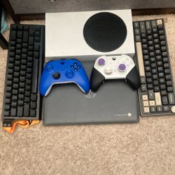 Xbox And Chromebook With Keyboards And Controllers