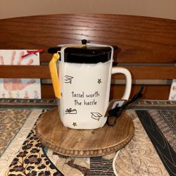 Rae Dunn Tassle/Hassle Grad Mug