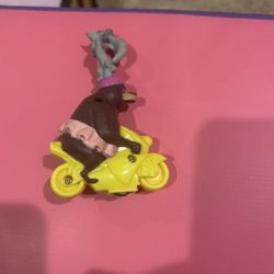 McDonald's Happy Meal toy featuring Sonya the Bear and King Julien from the movie Madagascar 3: Europe's Most Wanted.  The toy was part of a promotion