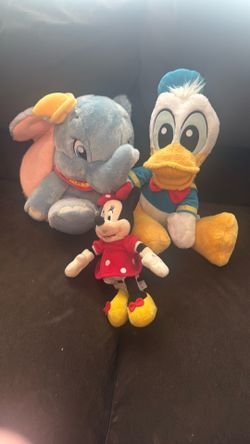 Dumbo, Minnie Mouse and daffy plushies