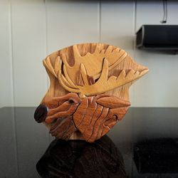 Wooden puzzle in the shape of a moose