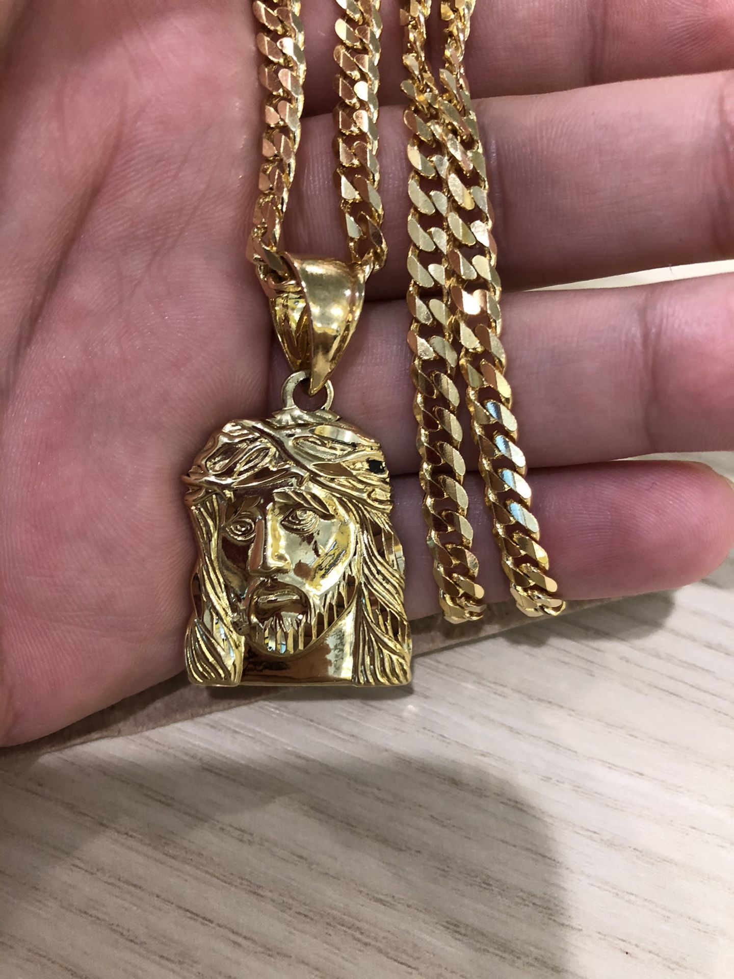14K Gold Chain & Jesus Piece. 22”in. Weighs 33.3 grams