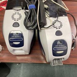 Two  Zebra ZXP Series 3 Card Printer.  