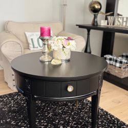 Black Round  Table with Gold Tipped Legs 28’W x 22’Tall