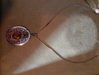 Vintage charm necklace that opens