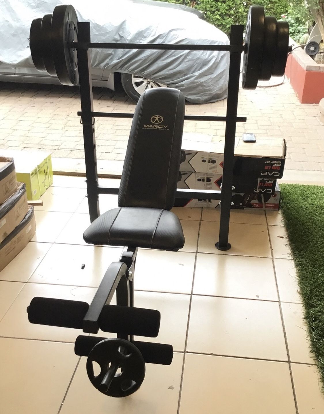 Gym Equipment Adjustable Bench press, barbell, leg developer and 100lbs of weight