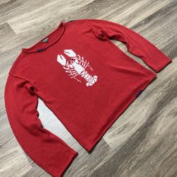 red sweater with a white lobster graphic is a Wide Crewneck Americana Pullover Sweater from the brand Wild Fable