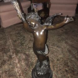  The Bronze  Sculpture Depiction Of  Cupid