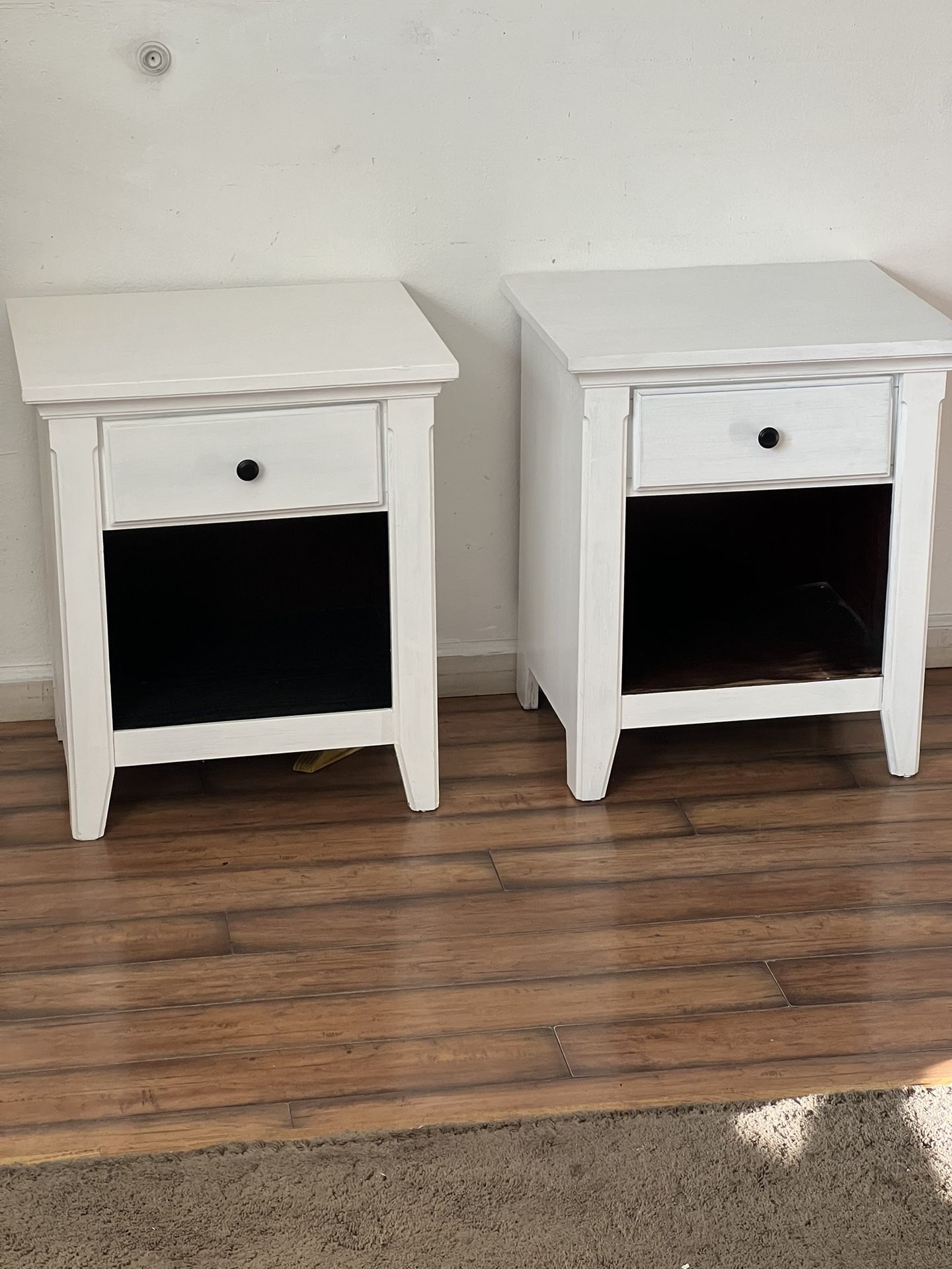 2 white living spaces night stands or end Tables