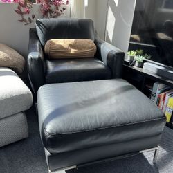 Black Leather Chairs (Two) And Ottoman
