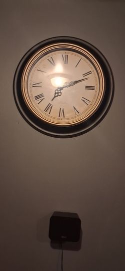 Wall clock nd 2 curtain rods