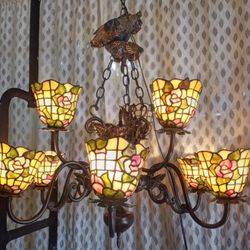 😍  breath taking and super heavy cast iron stained glass chandelier, name on it is  "Stiffel"