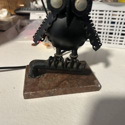 handcrafted owl sculpture made from repurposed scrap
