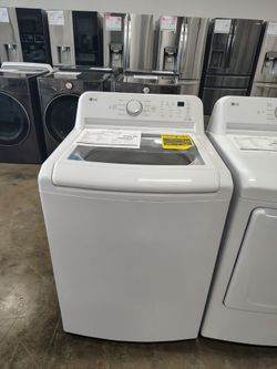 LG 4.3 cu ft Ultra Large Capacity Top Load Washer with 4way Agitator Turbo Drum Technology
