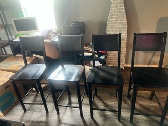 Four wood bar stools