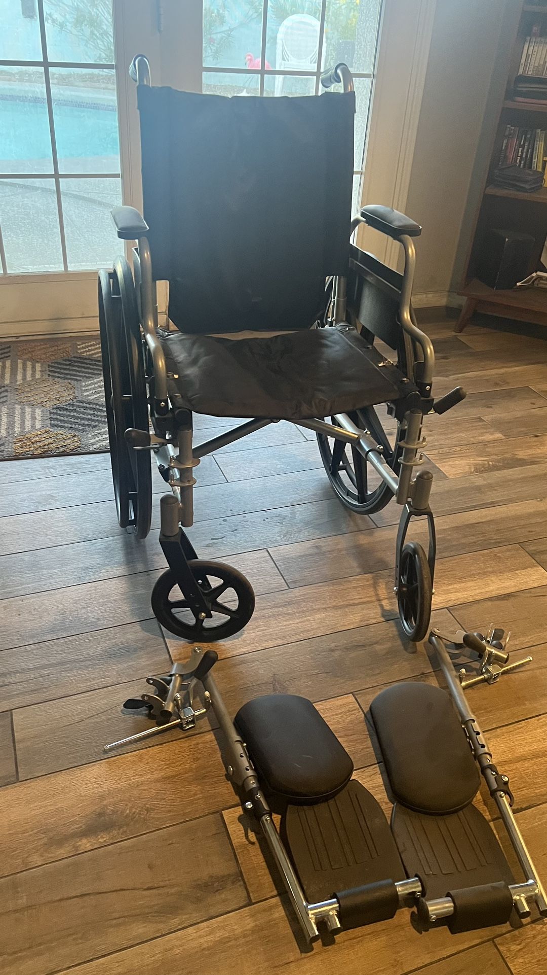 Medline Lightweight & User-Friendly Wheelchair With Flip-Back, Desk-Length Arms & Elevating Leg Rests for Extra Comfort, Black, 18 inch Seat