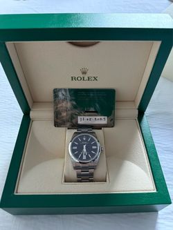 Rolex OP41 124300
