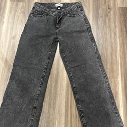 Black Jeans With Pink Bows In The Back Pocket 