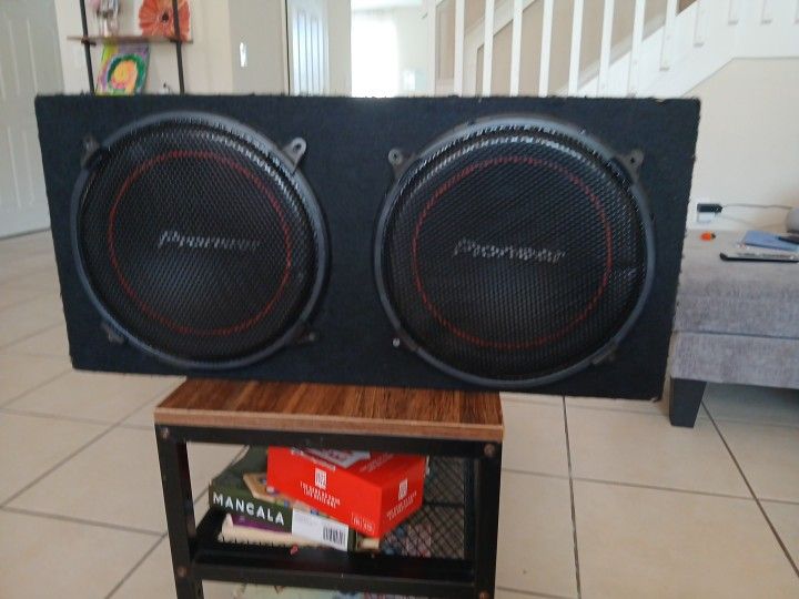 Two Ten Inch Proneer Sub  With Boss Amplifier 