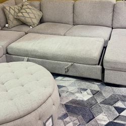 Brand New Sectional With Under Pull Out Bed-Ottoman 