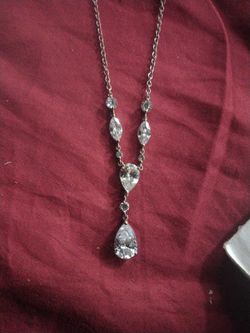 Sterling Silver Necklace With High Quality CZ stones in a Dangling type setting.