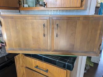 Nice older wood cabinet - need gone
