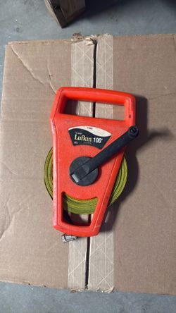 This is a vintage Crescent Lufkin 100-foot Hi-Viz orange measuring tape reel.
