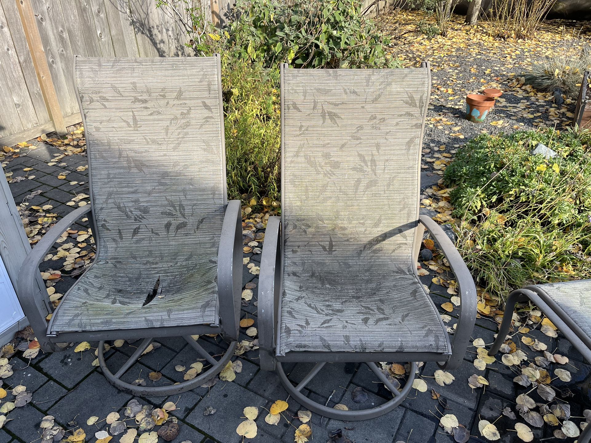 Tropitone Sling High Back Swivel Patio Dining Chairs And Ottoman