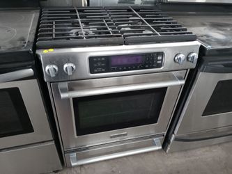 KitchenAid stainless steel 4-burner dual-fuel slide-in range - Free delivery