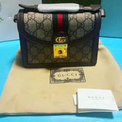 Gucci Ophidia small Top Handle Bag.