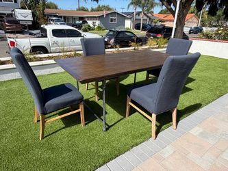 Wooden table and blue chairs