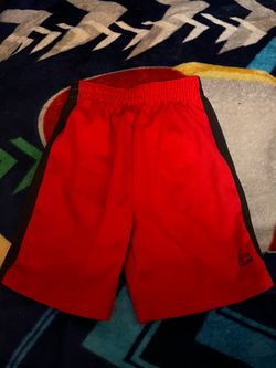 Red Athletic Shorts with Black Side Stripes