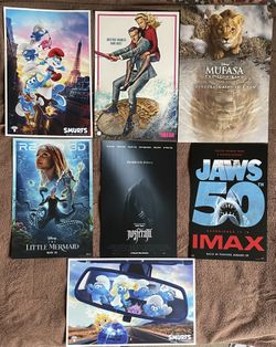 7 Movie Posters: Mufasa The Lion King, Jaws, Nosferatu, The Naked Gun, The Little Mermaid. Smurfs