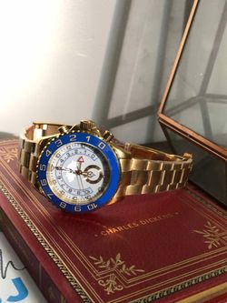 Gold-Tone Watch with Blue Bezel