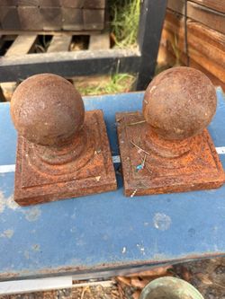 2 med size metal pole tops