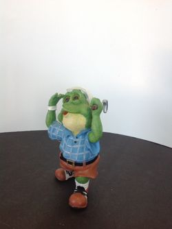 Ceramic frog looking for where his ball went!