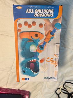 Boy toy - shooting dinosaur