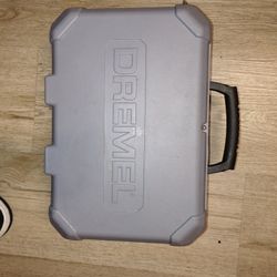 Brand New Dremel In The Case With Attachments
