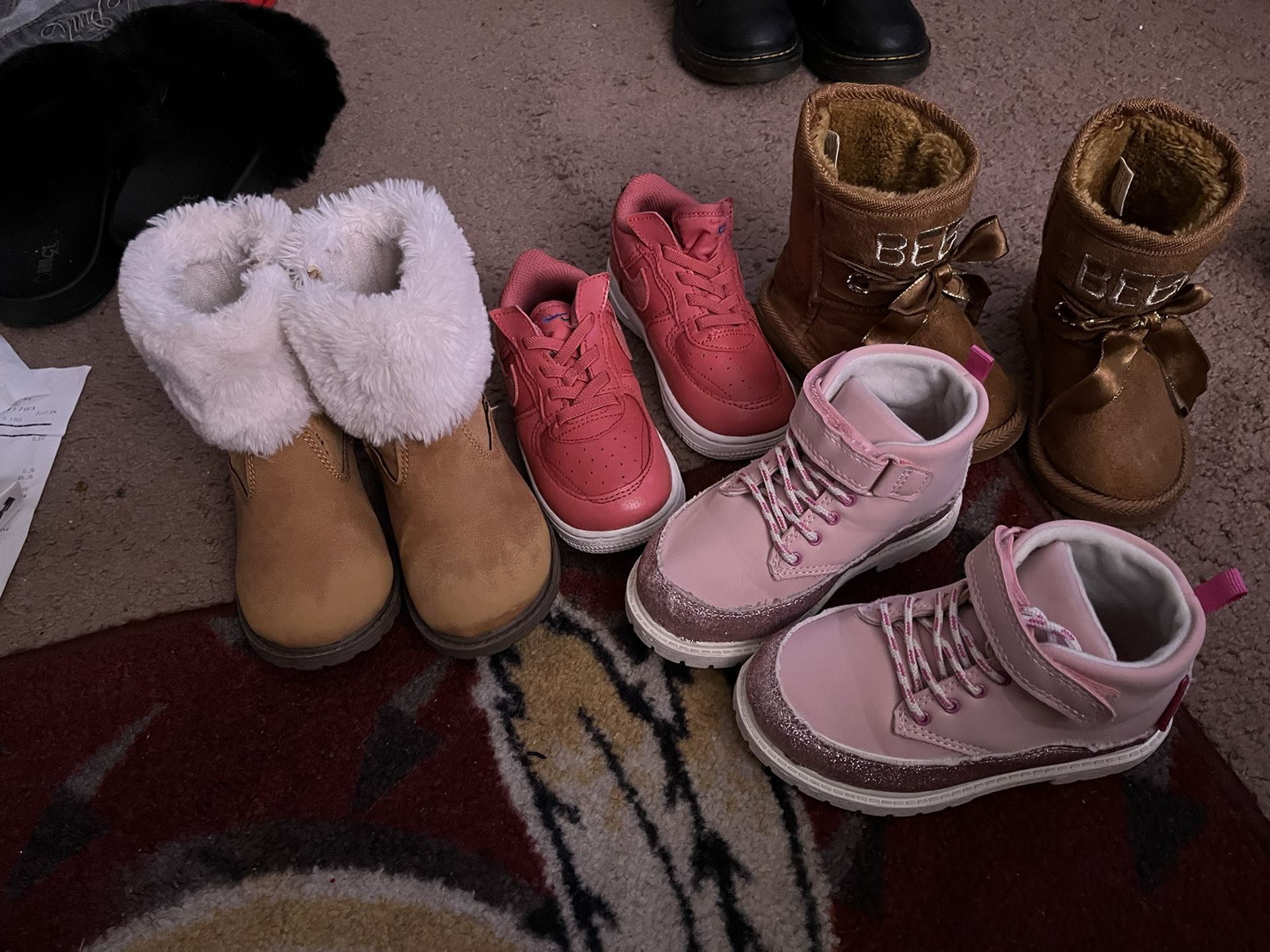 2 Pair Girl Size 7..Black Boots, & Tan BeBe With Fur inside, (2 Pair Size 8 Pink Nike’s & pink Boots Carter’s)1 Pair size 9 Tan With Fur prices👇🏽