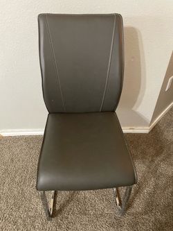 Dark Gray Leather Chair With Seat Cover