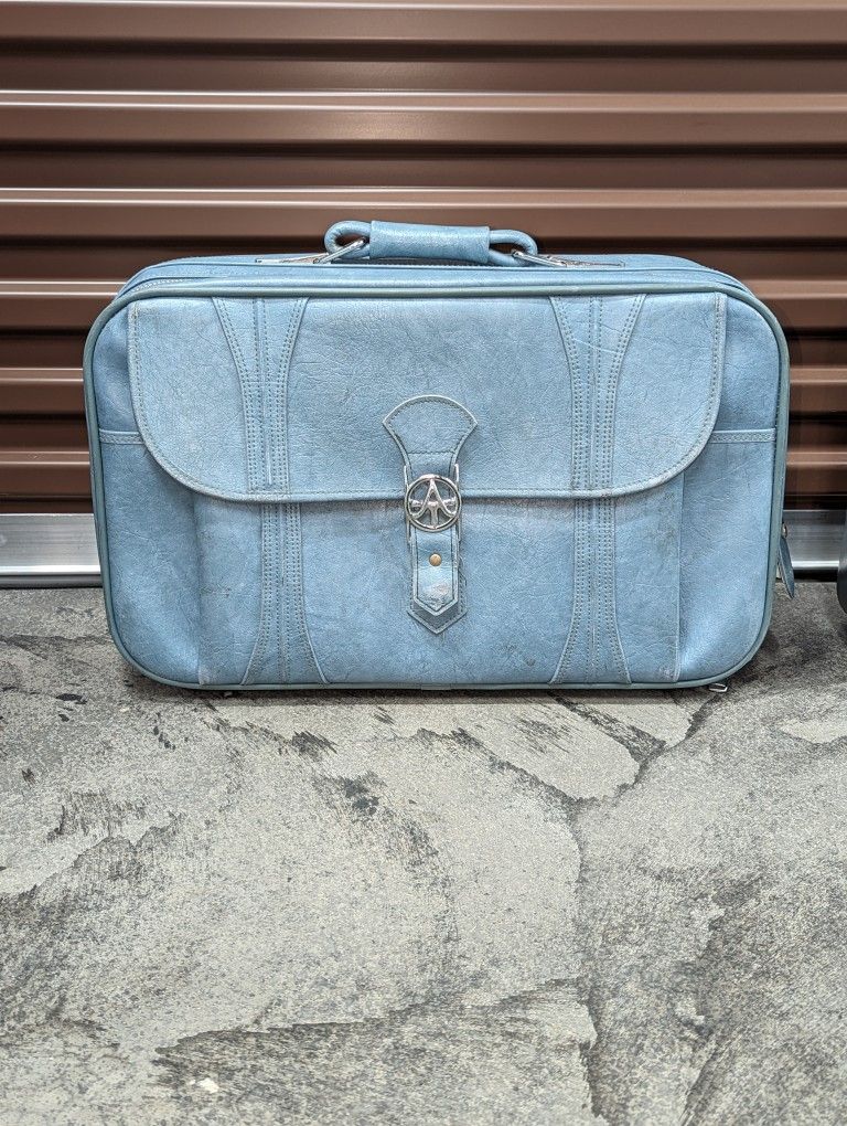 American Tourister Retro Blue Vegan Leather Suitcase