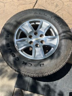 Only one / rim for Chevy / whit tire